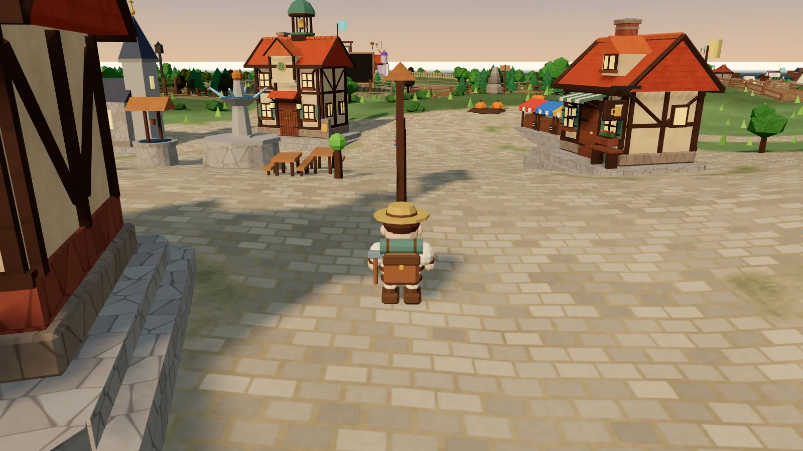 A small blocky settler in a straw hat and backpack standing on the cobbled town square, with the town hall, a fountain, the well and a timber-framed tavern with market awnings around it.